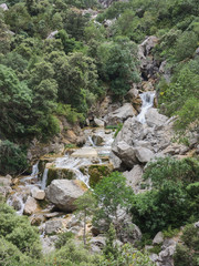 Cascades of the Guadalquivir River as it passes through Cerrada de Utrero in the Natural Park of the Sierra de Cazorla, Segura and Las Villas. In Jaén, Andalusia. Spain