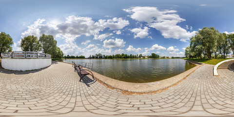 full seamless spherical hdri panorama 360 degrees angle view on concrete pier of huge lake or river...