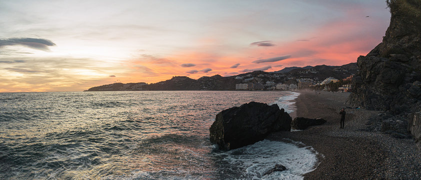 sunset on coast of sea, Almunecar Spain