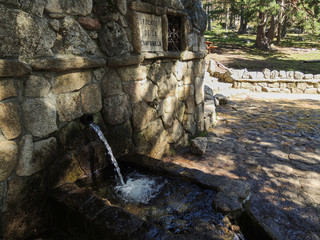Campanilla fountain in the La Barranca Valley in the Sierra de Guadarrama National Park. Madrid's community. Spain