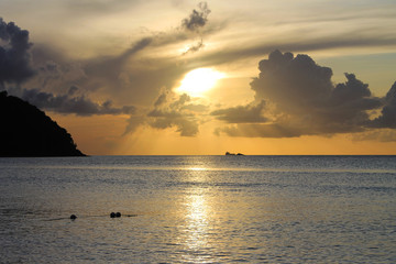 Ship on the horizon at sunset, Caribbean Sea, St. Lucia, West indies
