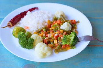 Rice with vegetables. Vegetarian lunch