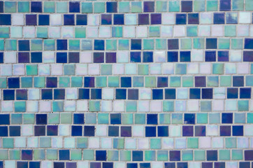 Textures of white, blue and green mosaic tile wall for background