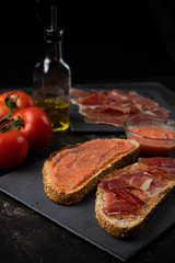 toast with ham oil and tomato
