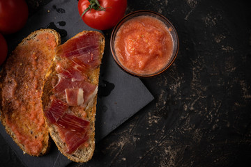 toast with ham oil and tomato