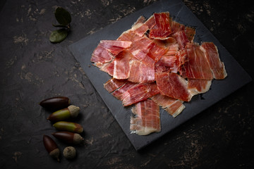 Acorn ham concept. pork product fed with oak acorns, also known in spain as black legged ham