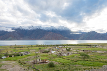 Ladakh, India - Aug 07 2019 - Pangong Lake view from Merak Village in Ladakh, Jammu and Kashmir, India. The Lake is an endorheic lake in the Himalayas situated at a height of about 4350m.