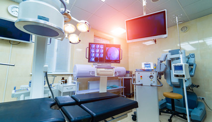 Modern operating room with advanced equipment, x-ray screen, interior in hospital, surgery, health care, emergency
