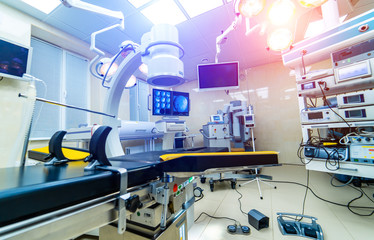 Modern equipment in operating room. Medical devices for neurosurgery. Background. Interior ewith x-ray screen and equipment
