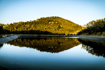 autumn landscape with lake and reflection in water