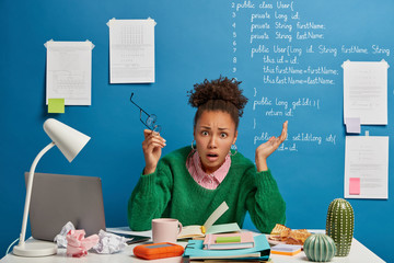 Puzzled indignant office worker feels confused with operational software problems, looks in panic,...