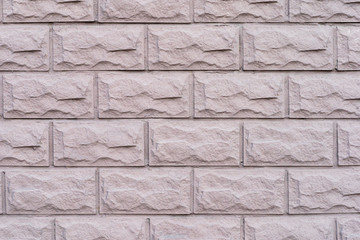 pink tiles in the form of a brick. texture background