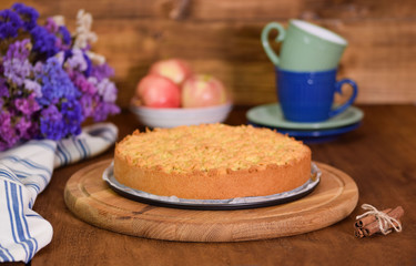 Obraz na płótnie Canvas Apple pie or homemade cake with apples on table. Delicous dessert apple tart.