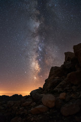 Beautiful detailed long exposure night photo of Milky Way, galaxies and constellations above mountains - 308120293