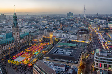 Hamburg at Christmas with the christmas market in the front of the town hall