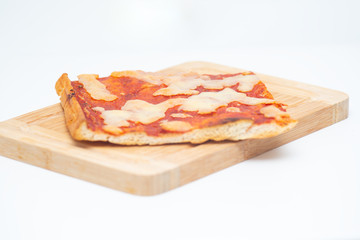 Italian pizza margherita closeup with tomato and mozzarella