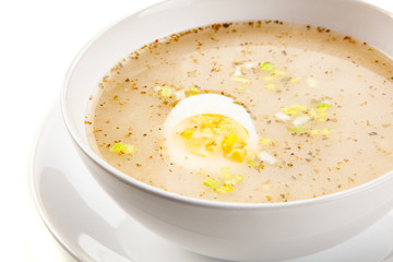  Sour rye soup on white background