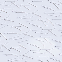 white cotton buds pattern on white background