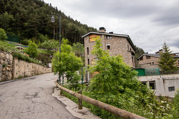 Naklejka premium Encamp - a small village in Pyrenees, in Andorra. Encamp has been considered an important summer and winter sports center for Andorra tourism. Near places: Engolaster's Lake, Ordino, Pasa De La Casa