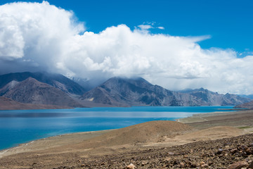 Ladakh, India - Aug 08 2019 - Pangong Lake view from Spangmik Village in Ladakh, Jammu and Kashmir, India. The Lake is an endorheic lake in the Himalayas situated at a height of about 4350m.
