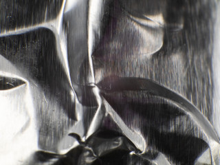 Metal textured background, silver, silver texture, silver foil sheet or paper.