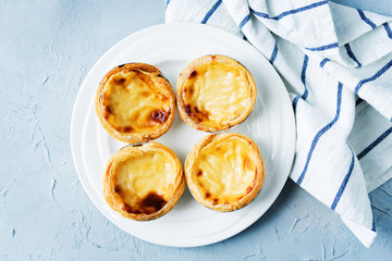 Portuguese custard pies, Pastel de Nata or Pastel de Belem. Traditional portuguese pastry