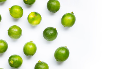 Fresh limes isolated on white background.