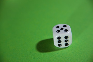 white cubes and small hearts on a green screen