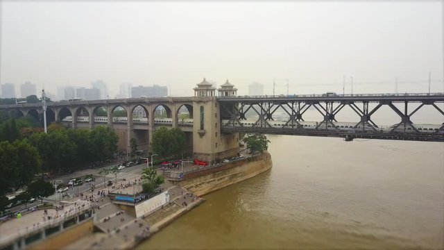 day wuhan city famous traffic changjiang bridge bay aerial panorama 4k tilt shift china