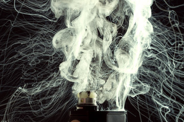 Electronic Cigarette vape explosion. cloud of vapor