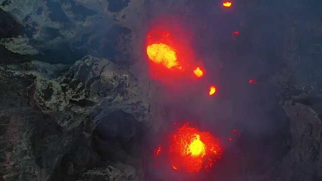 2019 - stunning dramatic aerial over Mt. Yasur volcano volcanic eruption lava on Tanna Island, Vanuatu.  