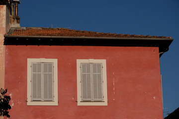 Two windows orange wall south of France