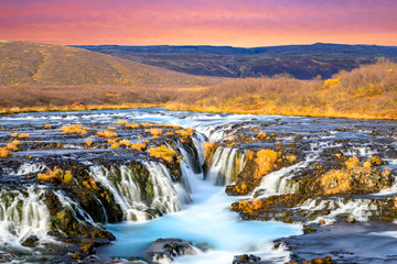 Beautiful Bruarfoss waterfall with turquoise water in Iceland.