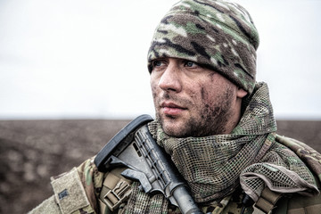 Portrait of modern army infantryman on march