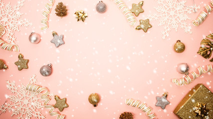 2020 Christmas and new year background banner with the beautiful decor open gift for holiday in winter. On bright pink, golden and silver color theme with snow flake. top view with copy space.