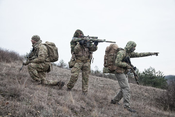 Fototapeta premium Military army soldiers team members patrolling area