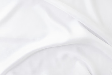 Obraz premium Biała szara satynowa tekstura, która jest białym srebrnym jedwabnym tłem tkaniny z pięknym miękkim wzorem rozmycia naturalnego.