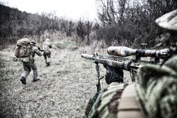 Commando army soldiers fighters squad rushing in woodland