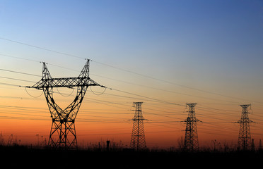 High voltage tower, silhouetted in the evening