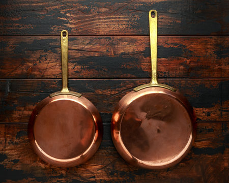 French Vintage Copper Saute Pans, Kitchen Utensil On Wooden Background