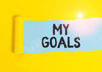 Writing note showing My Goals. Business concept for a future or desired result that a demonstrating...