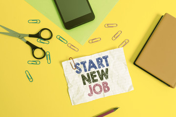 Text sign showing Start New Job. Business photo text getting recruited in company Sign fresh work contract Paper sheets pencil clips smartphone scissors notebook colored background