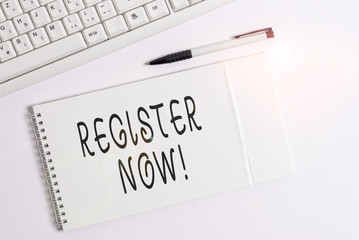 Conceptual hand writing showing Register Now. Concept meaning official list or record showing or things into web or forum White pc keyboard with note paper above white background