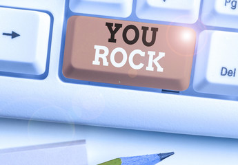 Word writing text You Rock. Business photo showcasing slang phrase of praise or encouragement...