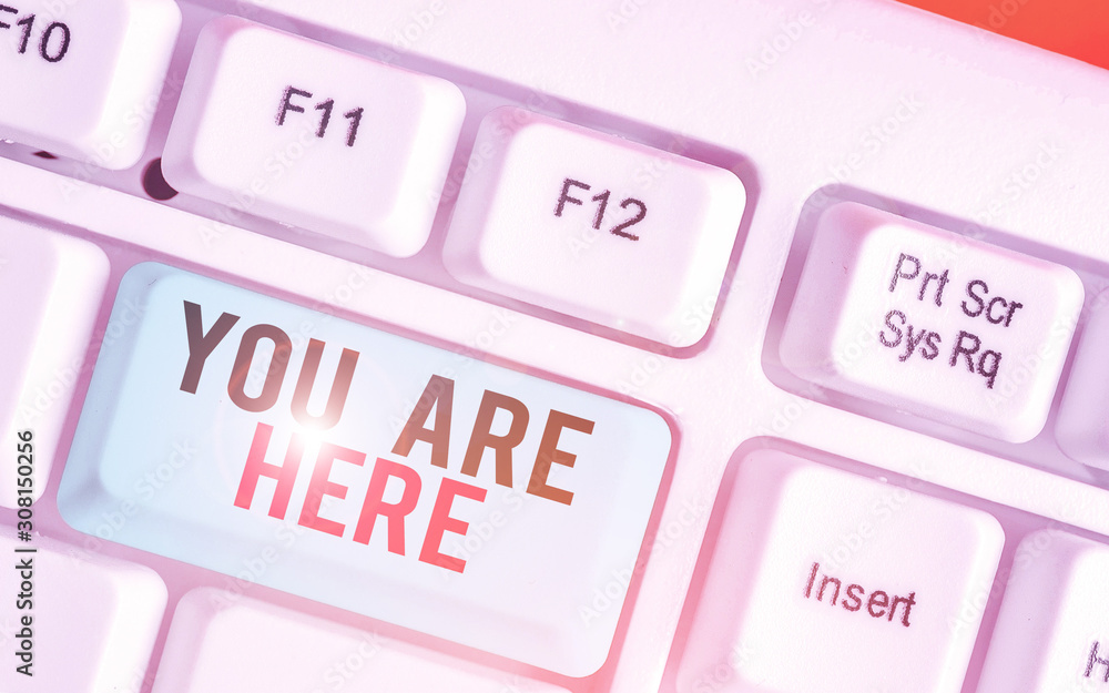Poster writing note showing you are here. business concept for this is your location reference point global