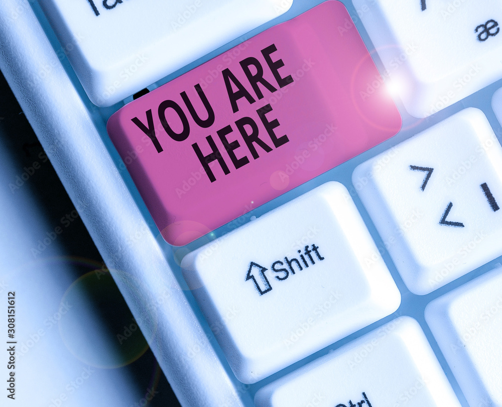 Poster conceptual hand writing showing you are here. concept meaning this is your location reference point 