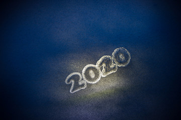 Artwork decoration. Happy new 2020 year. Empty space for your text. 2020 written on the snow