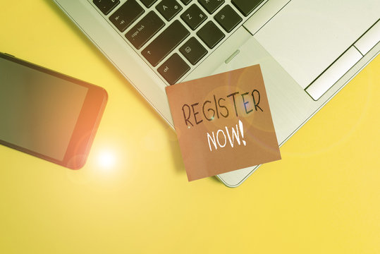 Word writing text Register Now. Business photo showcasing official list or record showing or things into web or forum Trendy laptop smartphone blank sticky note empty text colored background