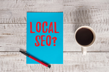 Writing note showing Local Seoquestion. Business concept for incredibly effective way to market...