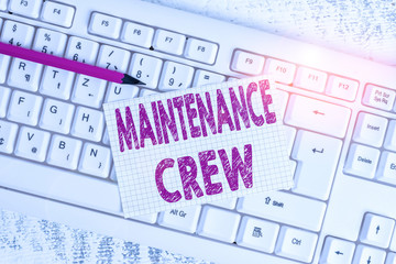 Word writing text Maintenance Crew. Business photo showcasing responsible for maintenance and repair work of buildings White keyboard office supplies empty rectangle shaped paper reminder wood